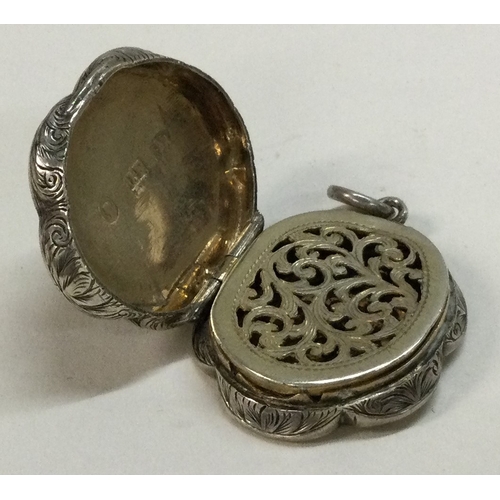 402 - A silver vinaigrette with stone decoration of Scottish design. Birmingham 1858. By James Fenton. App... 