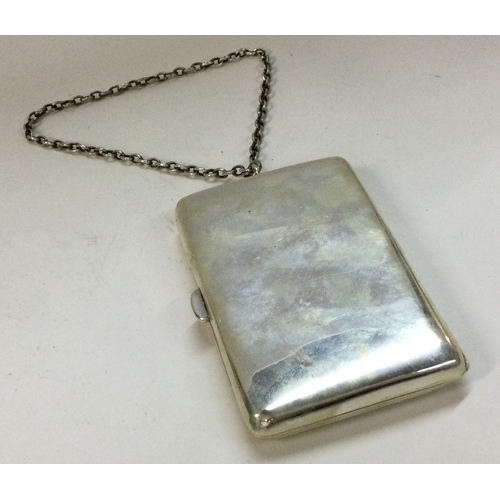 408 - A heavy silver combination double sovereign case / compact / cigarette case on suspension chain. Lon... 