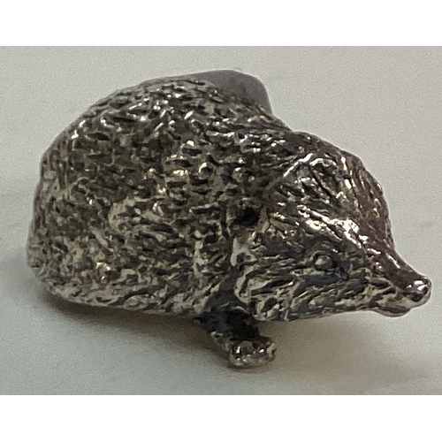 41 - A silver plated figure of a hedgehog. Est. £20 - £30.