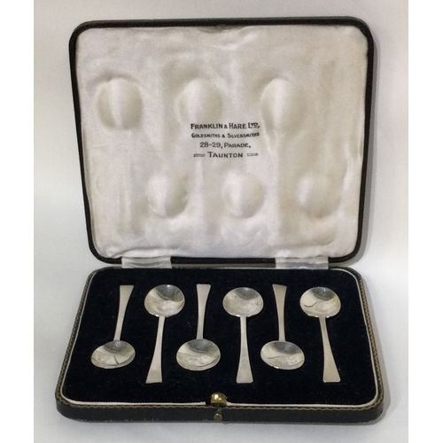 44 - A boxed set of six silver coffee spoons. Sheffield. Approx. 36 grams. Est. £15 - £20.