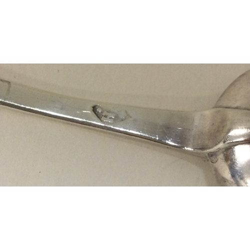 449 - A Queen Anne silver crested dog nose spoon. London. Circa 1710. By John Clifton. Approx. 46 grams. E... 