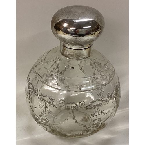 451 - A large silver and glass scent bottle. Birmingham. Est. £80 - £120.