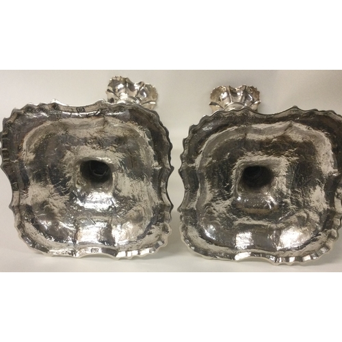 478 - A good pair of Georgian cast silver candlesticks. London. By WC. Approx. 1210 grams. Approx. 24.5 cm... 