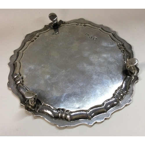 498 - An 18th Century silver salver with coat of arms to centre. Approx. 249 grams. London 1782. Est. £200... 