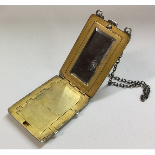 502 - A silver and enamelled compact on suspended chain with scene of a mosque. Approx. 72 grams. Est. £30... 