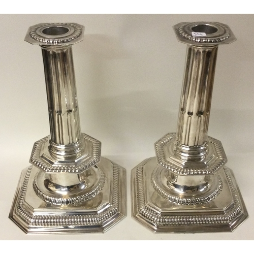 54 - A fine pair of of Queen Anne style cast silver candlesticks. London 1901. By Pairpoint Brothers. App... 