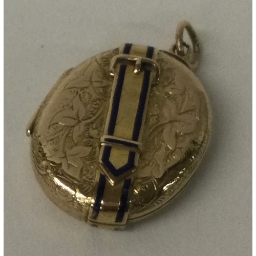 545 - A Victorian gold and enamelled locket with buckle decoration. Approx. 6 grams. Est. £80 - £120.