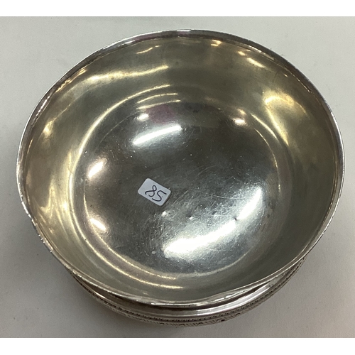 58 - An Arts and Crafts silver and wooden bowl. Inscribed MISEREMINI MEI SALTEM AMICI MEI. Sheffield 1927... 