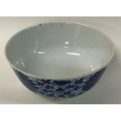 600 - A small blue and white bowl. Signed to base. £60 - £80.