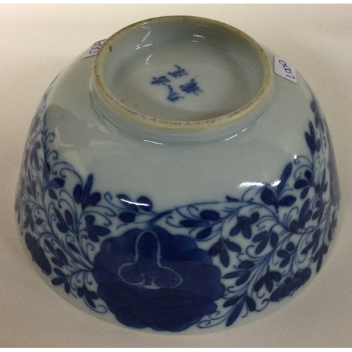 600 - A small blue and white bowl. Signed to base. £60 - £80.