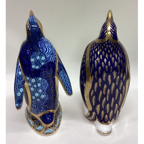 606 - Two Royal Crown Derby penguins. Est. £20 - £30.