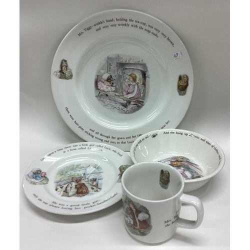 619 - BEATRIX POTTER: A four piece Wedgwood 