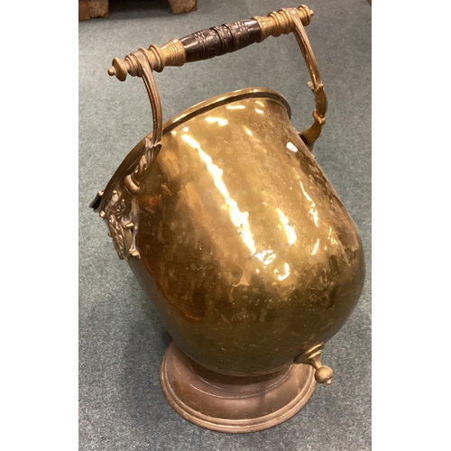 623 - An old brass hinged front coal box. Est. £20 - £30.