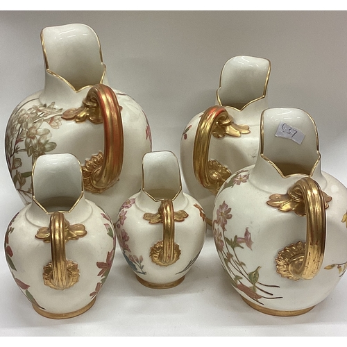 637 - A good set of five Royal Worcester gilt ewers. Est. £80 - £120.