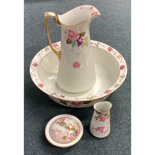 638 - An Ironstone pottery four piece jug and basin set. Est. £20 - £30.