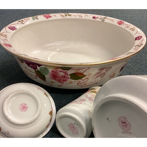 638 - An Ironstone pottery four piece jug and basin set. Est. £20 - £30.