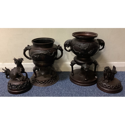 641 - A good matched pair of bronze censers on stands with lift off covers decorated with animals. Est. £4... 