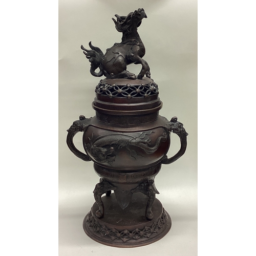 641 - A good matched pair of bronze censers on stands with lift off covers decorated with animals. Est. £4... 