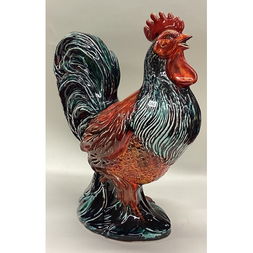 643 - ANITA HARRIS: A large pottery figure of a cockerel. Signed to base. Est. £80 - £120.