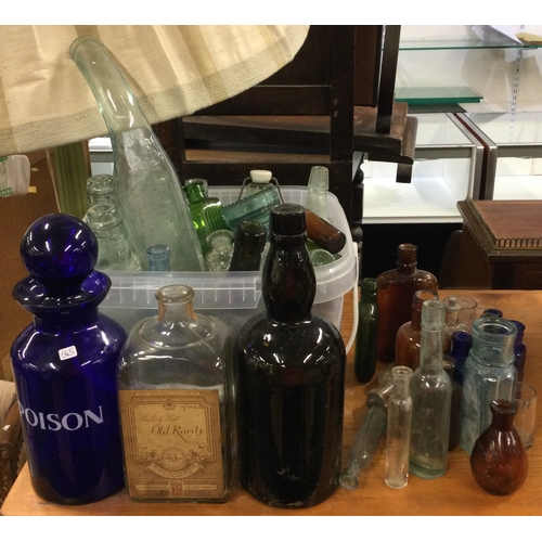 645 - A large collection of chemist bottles etc. Est. £20 - £30.