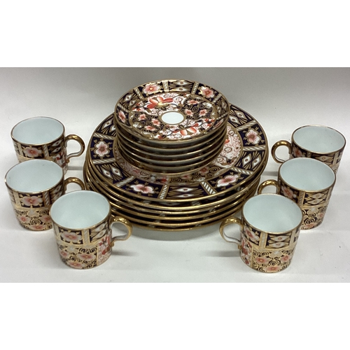 676 - A good six piece Royal Crown Derby coffee set. Numbered 2451. Est. £80 - £120.