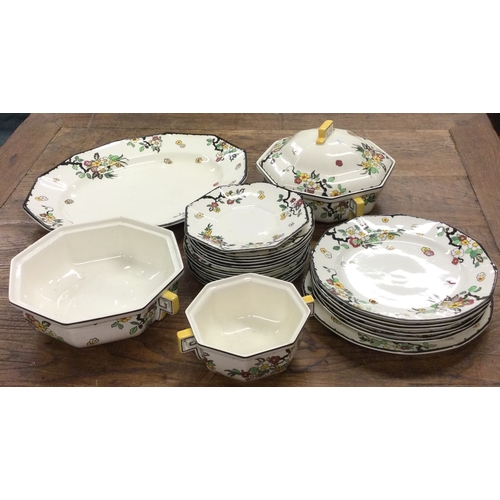 680 - A decorative Ironstone dinner service. Est. £20 - £30.