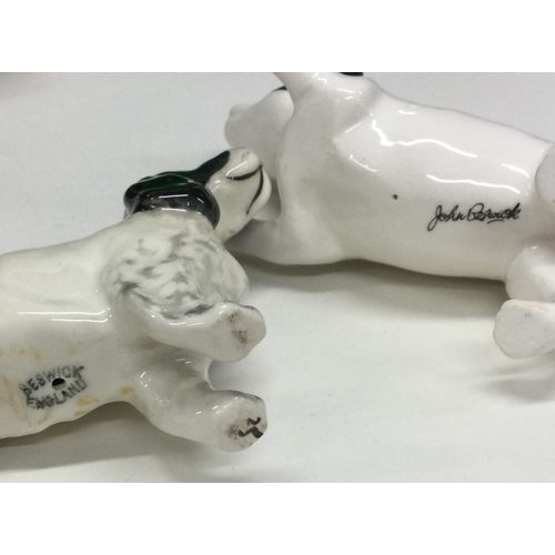 690 - Two boxed Beswick Spaniel dog figures. Est. £20 - £30.