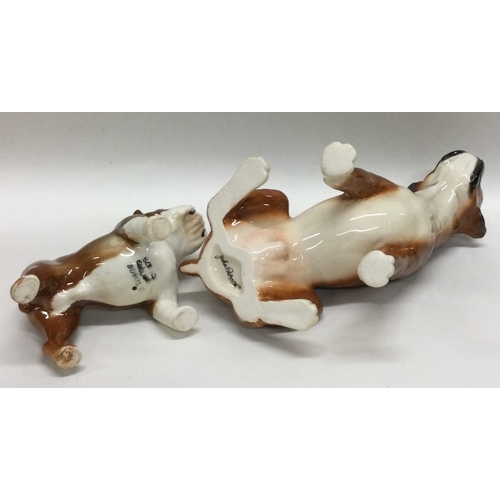 691 - Two boxed Beswick Boxer dog figures. Est. £20 - £30.