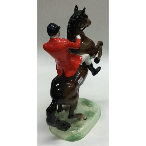 698 - A tall Beswick figure of a huntsmen on horseback. Numbered to base 868. Est. £50 - £80.