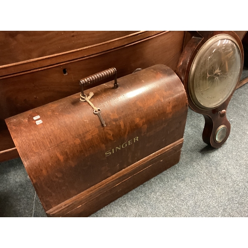 716 - A banjo barometer together with a sewing machine. Est. £20 - £30.