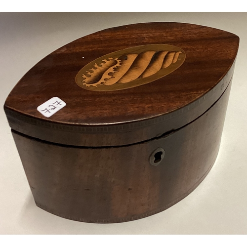 727 - An oval mahogany Georgian tea caddy with shell inlay. Est. £100 - £150.