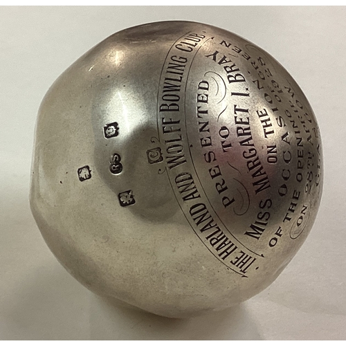 75 - GLASGOW: OF BOWLING INTEREST: A silver bowling jack. Approx. 340 grams. Est. £120 - £150.