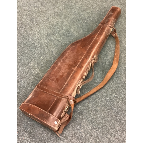 755 - An old leather gun holder. Est. £50 - £80.