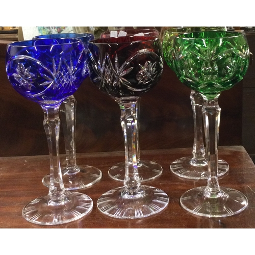 761 - A set of six coloured cut glass hock glasses. Est. £40 - £60.