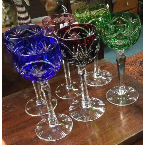 761 - A set of six coloured cut glass hock glasses. Est. £40 - £60.