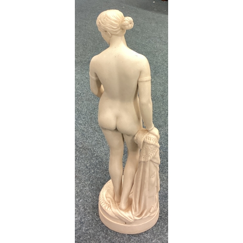 762 - A tall alabaster figure of a lady. Est. £30 - £40.