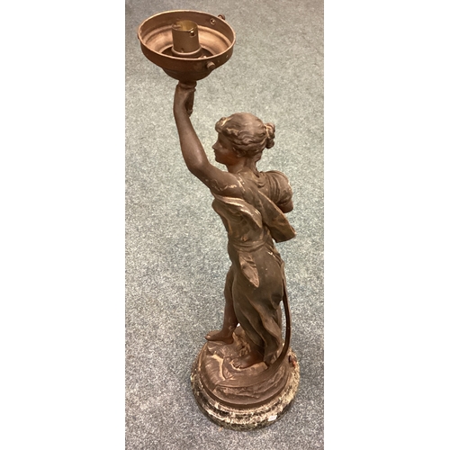 763 - A tall spelter lamp depicting a lady on marble base. Est. £30 - £40.