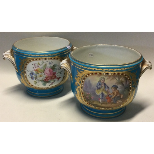 791 - An attractive pair of Continental jardinières decorated with figures. Est. £30 - £50.