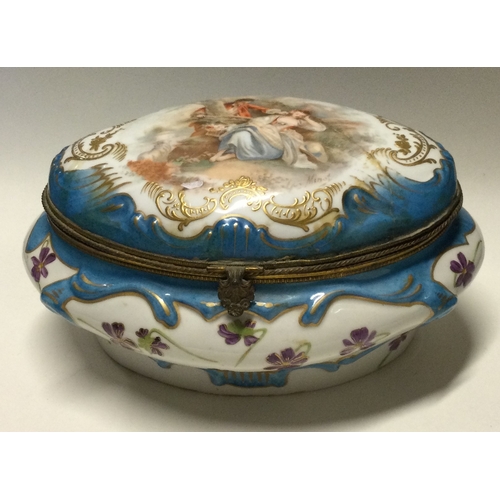 793 - A large Continental porcelain caddy decorated with figures and flowers. Est. £30 - £50.