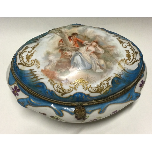 793 - A large Continental porcelain caddy decorated with figures and flowers. Est. £30 - £50.