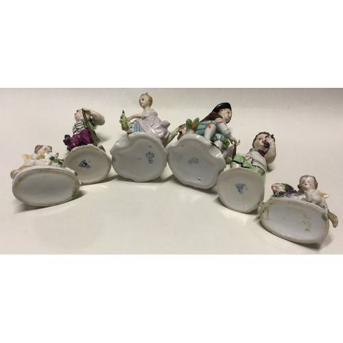 794 - A collection of six Continental porcelain figures. Est. £30 - £50.