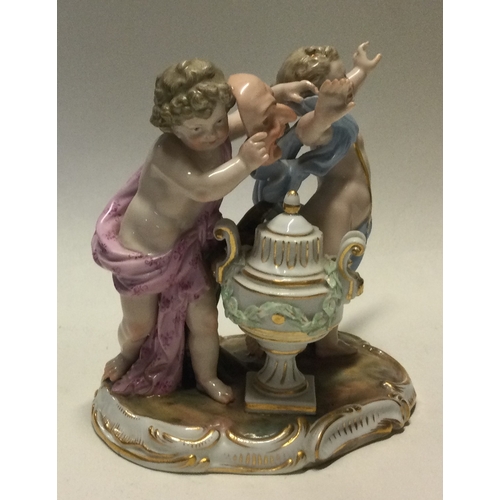 797 - MEISSEN: An attractive group depicting figures with gilt decoration. Est. £30 - £50.