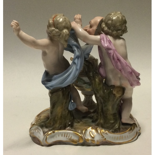 797 - MEISSEN: An attractive group depicting figures with gilt decoration. Est. £30 - £50.