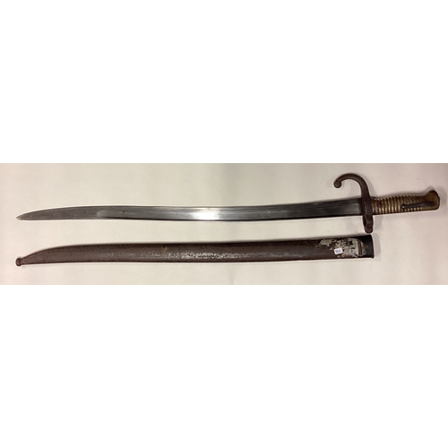 801 - A brass mounted bayonet with sheath. Est. £30 - £40.