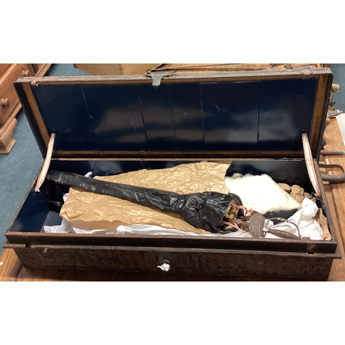 802 - An old dress sword with steel handle complete with uniform. Est. £30 - £40.