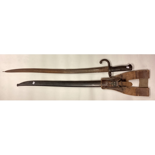 814 - An old bayonet. Est. £30 - £50.