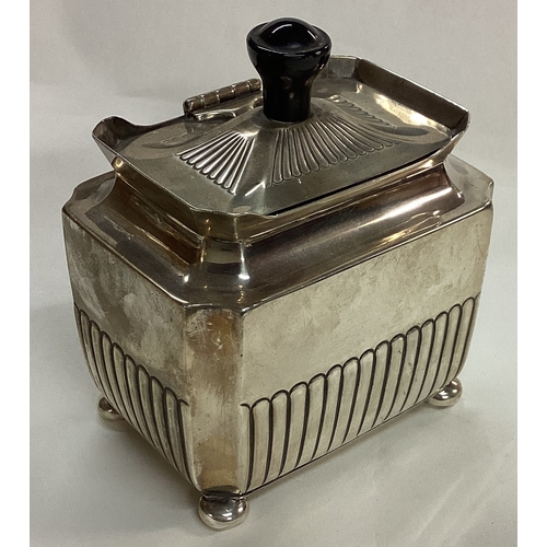 83 - A heavy Victorian silver tea caddy of fluted design. Sheffield 1873. By Henry Stratford. Approx. 188... 