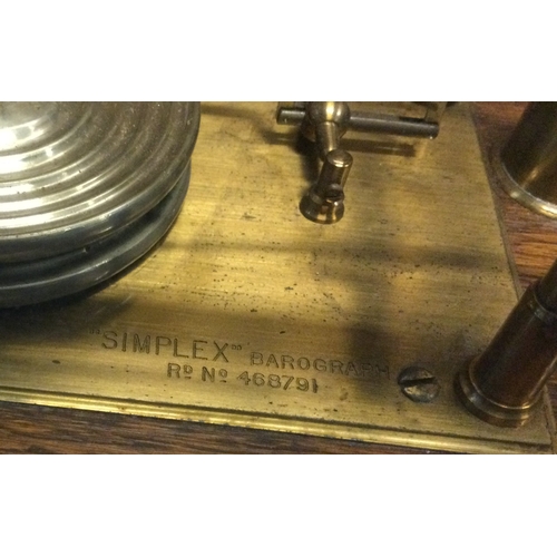 831 - A good Simplex barograph. Est. £80 - £120.