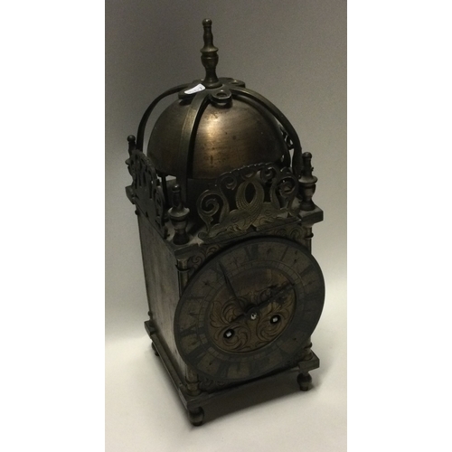 832 - A good brass lantern clock with gilt dial. Retailed by Mappin & Webb. Est. £150 - £250.