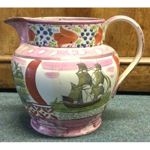 848 - A lustre jug decorated with figures. Est. £20 - £30.